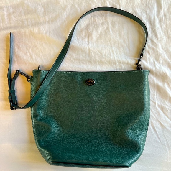 Elegant Coach Crossbody Bag crafted from high-quality pebbled leather. - Picture 1 of 4